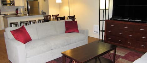  Comfortable seating area with 46 inch flat screen TV