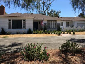 Private circular driveway for off-street parking. Two car garage.