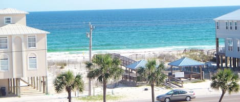 View from balcony of deeded beach access and pavilions