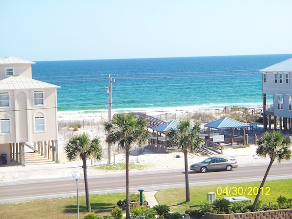 View from balcony of deeded beach access and pavilions