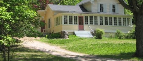 Circular pull through driveway, an acre of land, across the road from Glen Lake