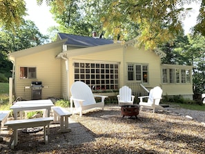 Fire pit , outdoor seating and picnic table , grill