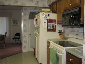 Full kitchen with stove, microwave, dishwasher, coffee machine, etc.