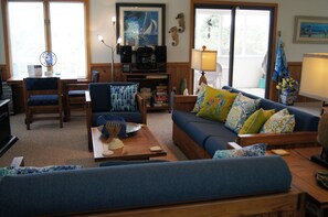 Living Room area - comfy seating for 6 and card table seating for 2