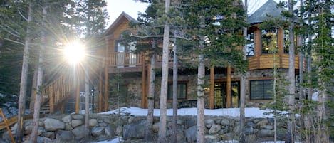 Custom log home just feet from a lake; beautiful inside and out; 1 hr to Denver.