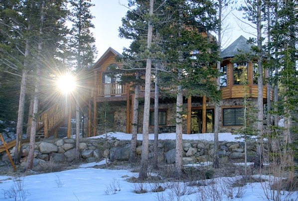 Custom log home just feet from a lake; beautiful inside and out; 1 hr to Denver.