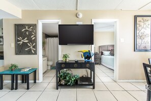 Living room entertainment with master bath and bedroom to the left and right.
