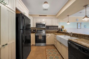 Updated granite kitchen with farm sink