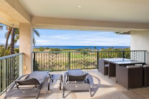 Lounges, side table, and 2 dining tables perfect for breakfast or dinner outside