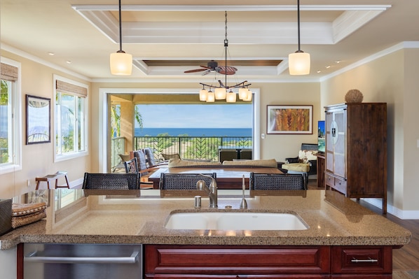 Fabulous ocean views from kitchen, dining, and great room and out to the lanai.