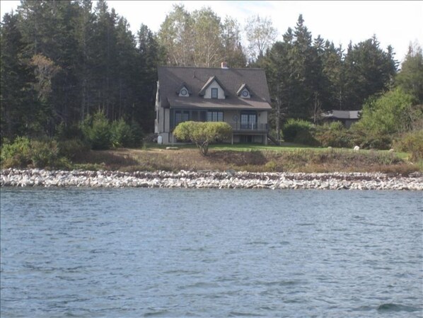 Shorefront location with spectacular views of islands and mountains.  