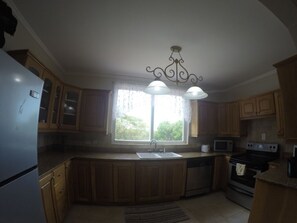 Large, fully equipped kitchen.