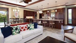 Open concept living and dining room with wine fridge in the kitchen