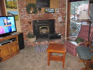 Living Room with Wood Burning Fireplace