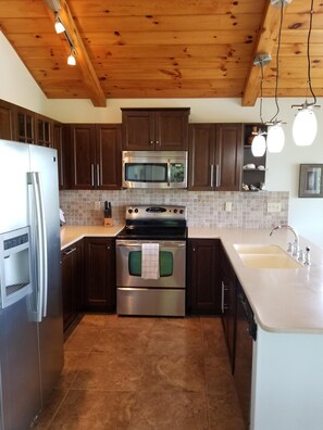 View of Kitchen open to the dining area and living area