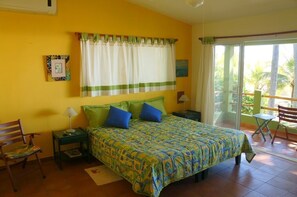MASTER BEDROOM UPSTAIRS WITH A BEAUTIFUL VIEW OF THE BEACH AND THE OCEAN