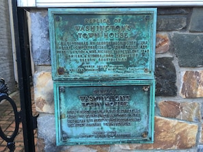 Historic markers on front of house