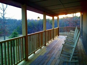 Amazing front porch for relaxing with a cup of coffee and old friends or family.