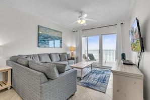 Main living area with view and door to balcony