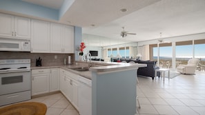 Kitchen + Great room. This is a big place. 1800 sqft!