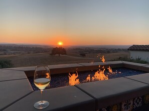 Enjoy a glass of wine with the sunset!