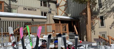 Outside of the ski lockers by the hot tubs!