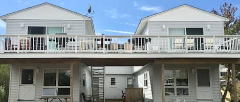 Huge deck to enjoy the sunset! House is a duplex. (Upstairs/Downstairs)