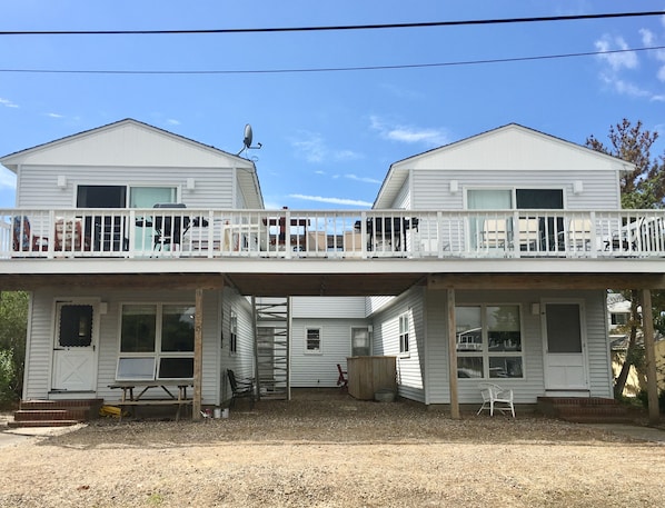 Huge deck to enjoy the sunset! House is a duplex. (Upstairs/Downstairs)