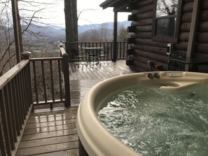 Hot tub for 5 on main floor with a fantastic view. 
