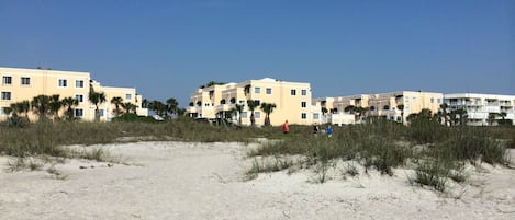 View from ocean beach looking back at condominium.