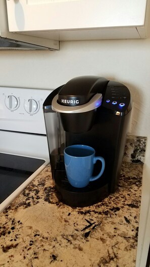 Keurig coffee maker.  Also, full pot coffee maker is stored under cabinet.