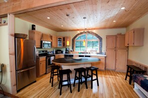 Beautiful kitchen with 2 refrigerators, stove, microwave, d/w, dbl sink, w/d.