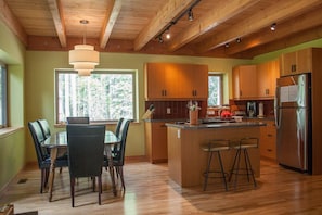 Open concept kitchen and dining area.