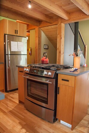 Gas range and oven on kitchen island