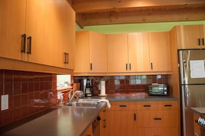 Immaculate fully equipped kitchen.