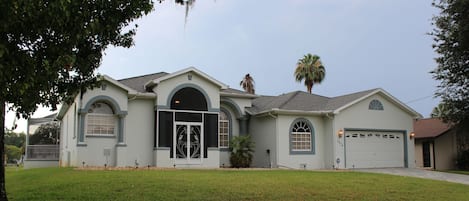 Lots of light, a huge garage, and a great dock with boat lift in the back.