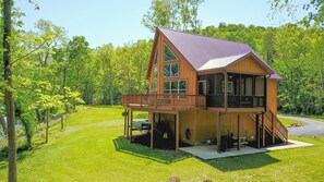 River cabin with modern interior and rustic/river exterior