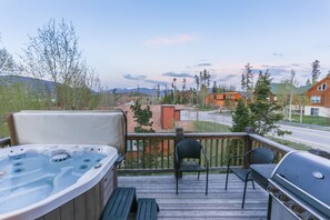 south facing deck with mountain and lake views