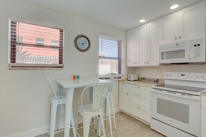 Eat in kitchen with additional seating for 4 at the breakfast bar. 