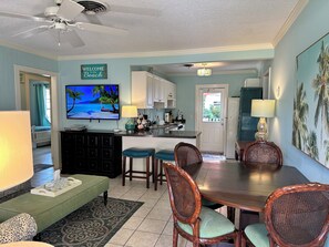Warm and inviting open concept kitchen, dining and family spaces.