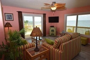 Living room with lots of windows to take in the view!