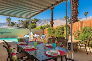 Outdoor area with pool and San Andreas Mountain. Fire pit