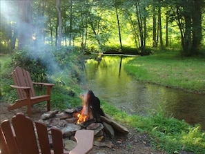 view from firepit down the creek