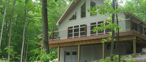 Private wooded location; spacious wraparound deck