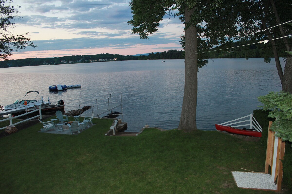 Beautiful lakefront home on Opechee, located mins. to skiing, shopping, & dining