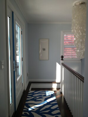 A bright and airy foyer welcomes you into our home