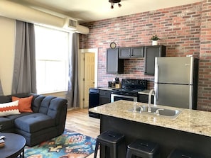 Full Kitchen with SS appliances and Granite