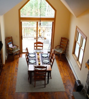 Dining area opening up to back deck