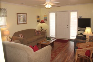 Living room looking toward back (pool) entrance.
