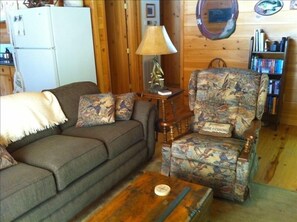 Full size sofa and recliner on main level.
